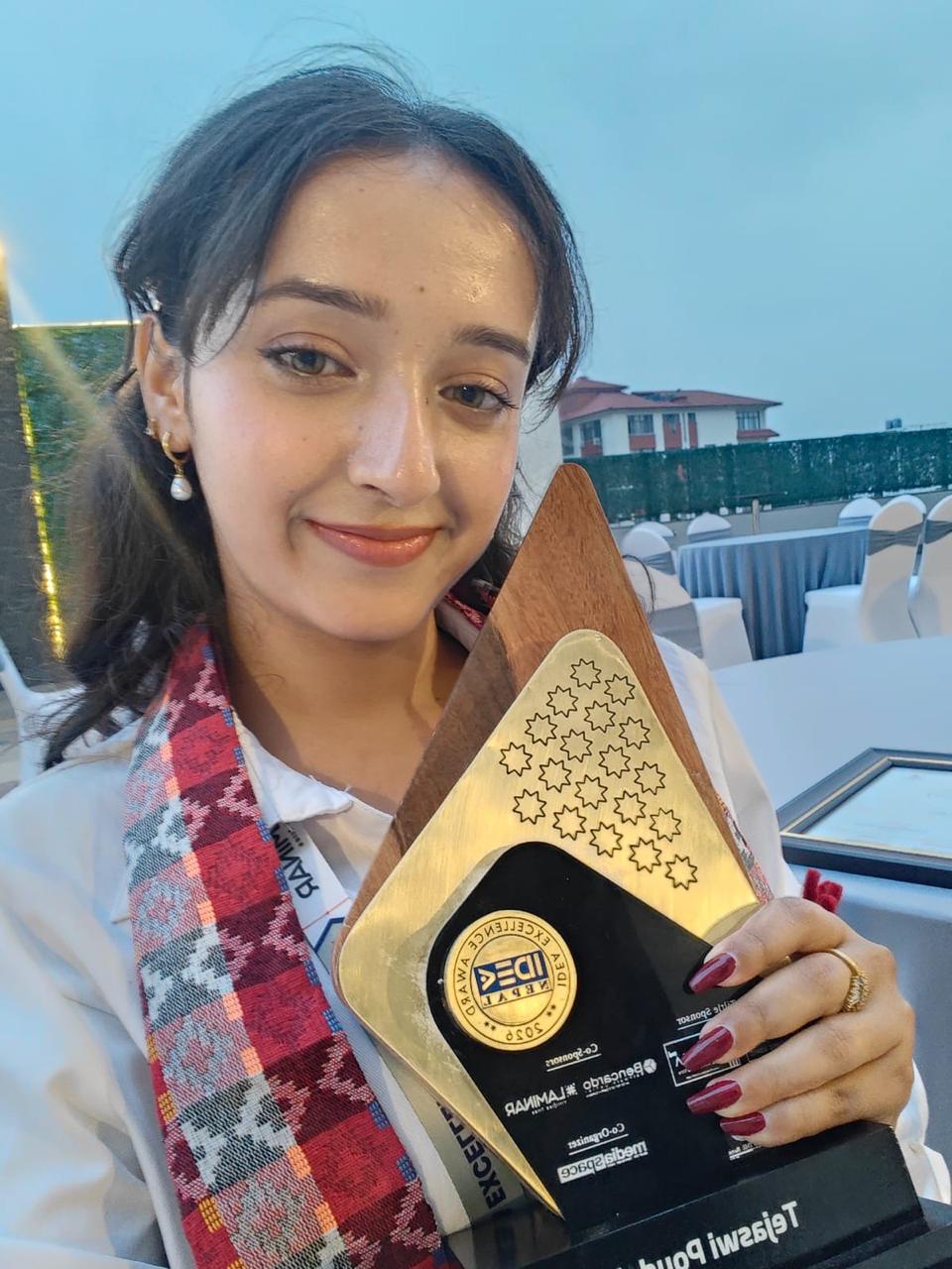 TEJASWI POUDEL